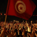 Indice démocratique 2024 : La Tunisie un pays hybride Drapeau